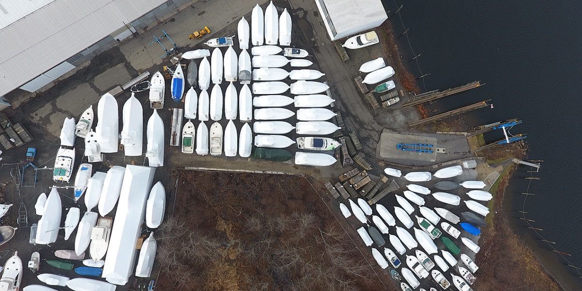 aerial shot of boats shrinkwrapped